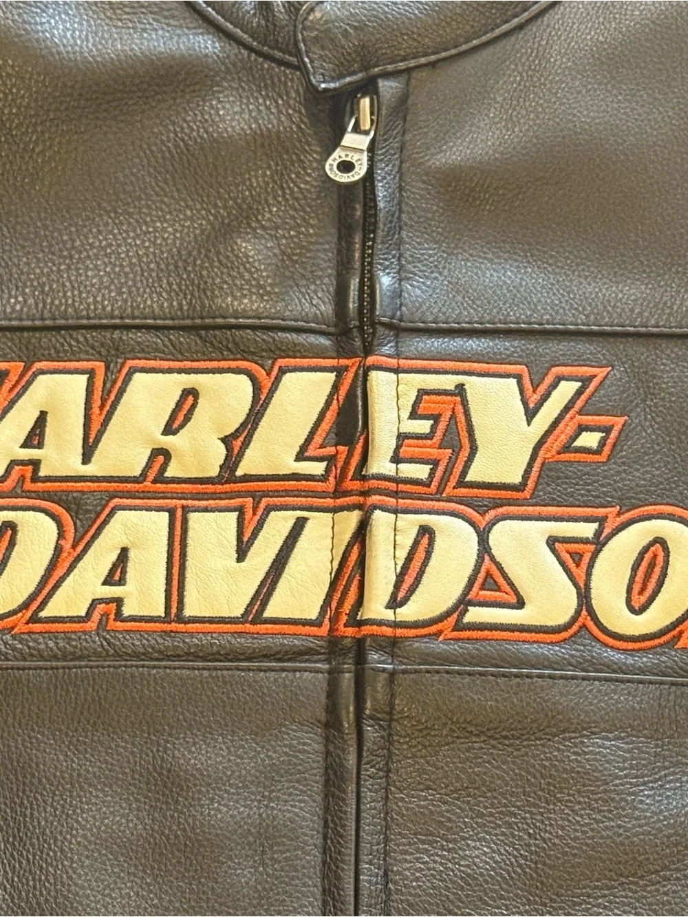 Harley-Davidson Black Leather Jacket with Orange and Cream Racing Stripes